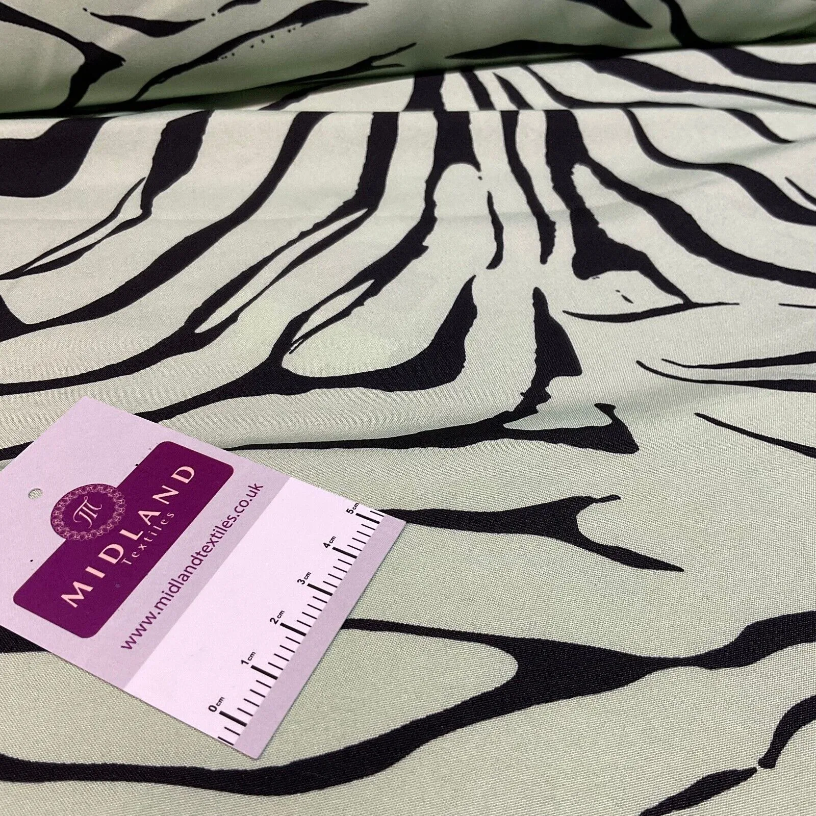 Zebra Animal Printed  peach crepe dress fabric sold by the meter M1942